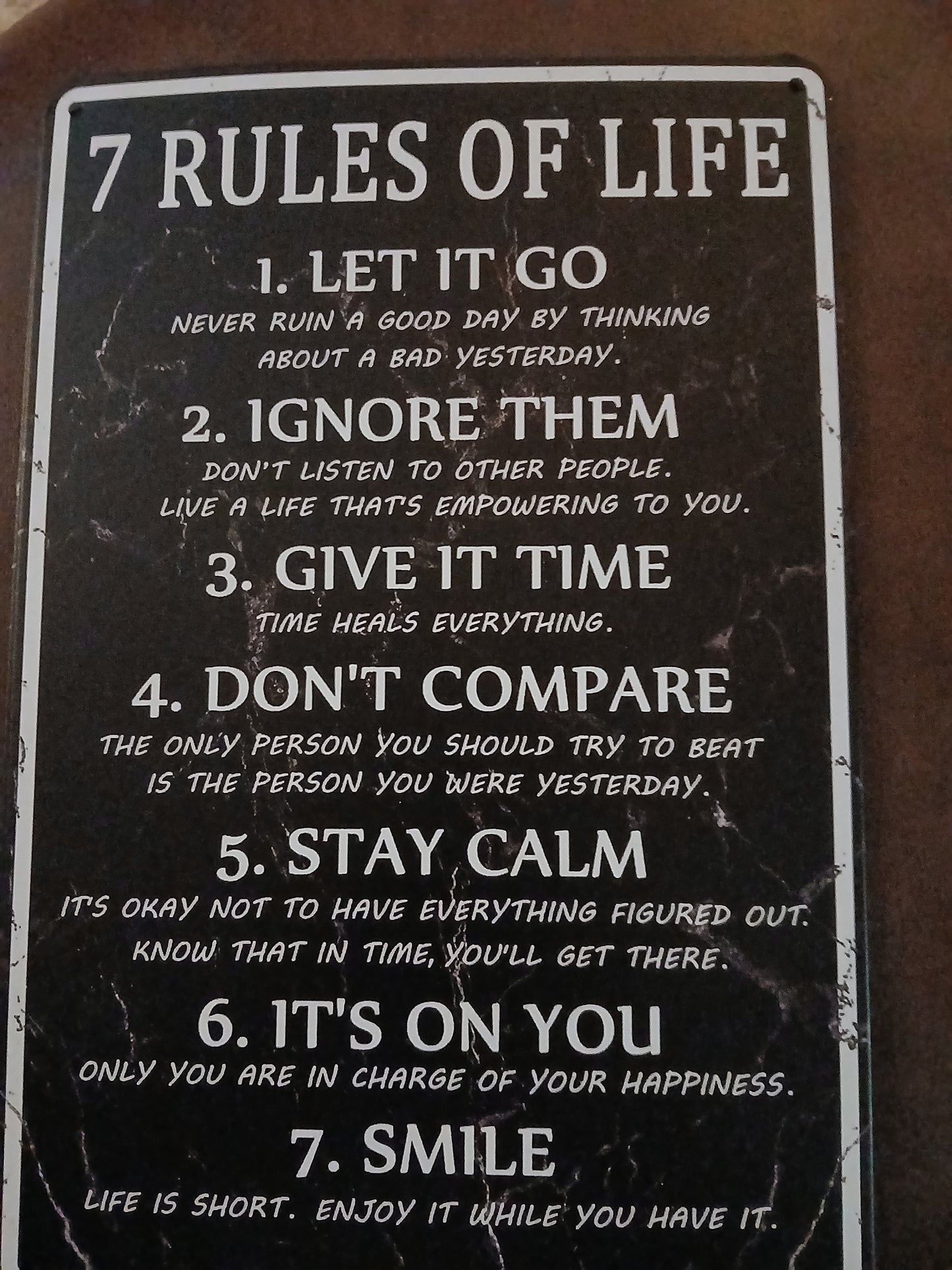 7 Rules of Life tin sign